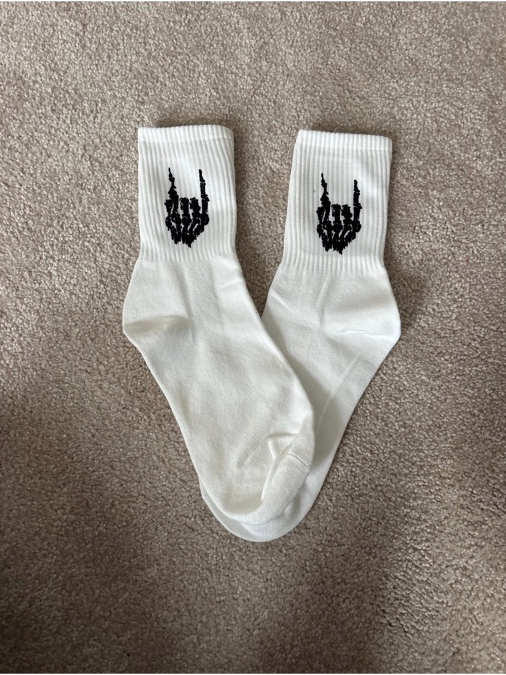 White Crew Socks with Black Skeleton Hand Graphic